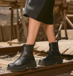 The Front Zip Lug Sole Bootie in Black